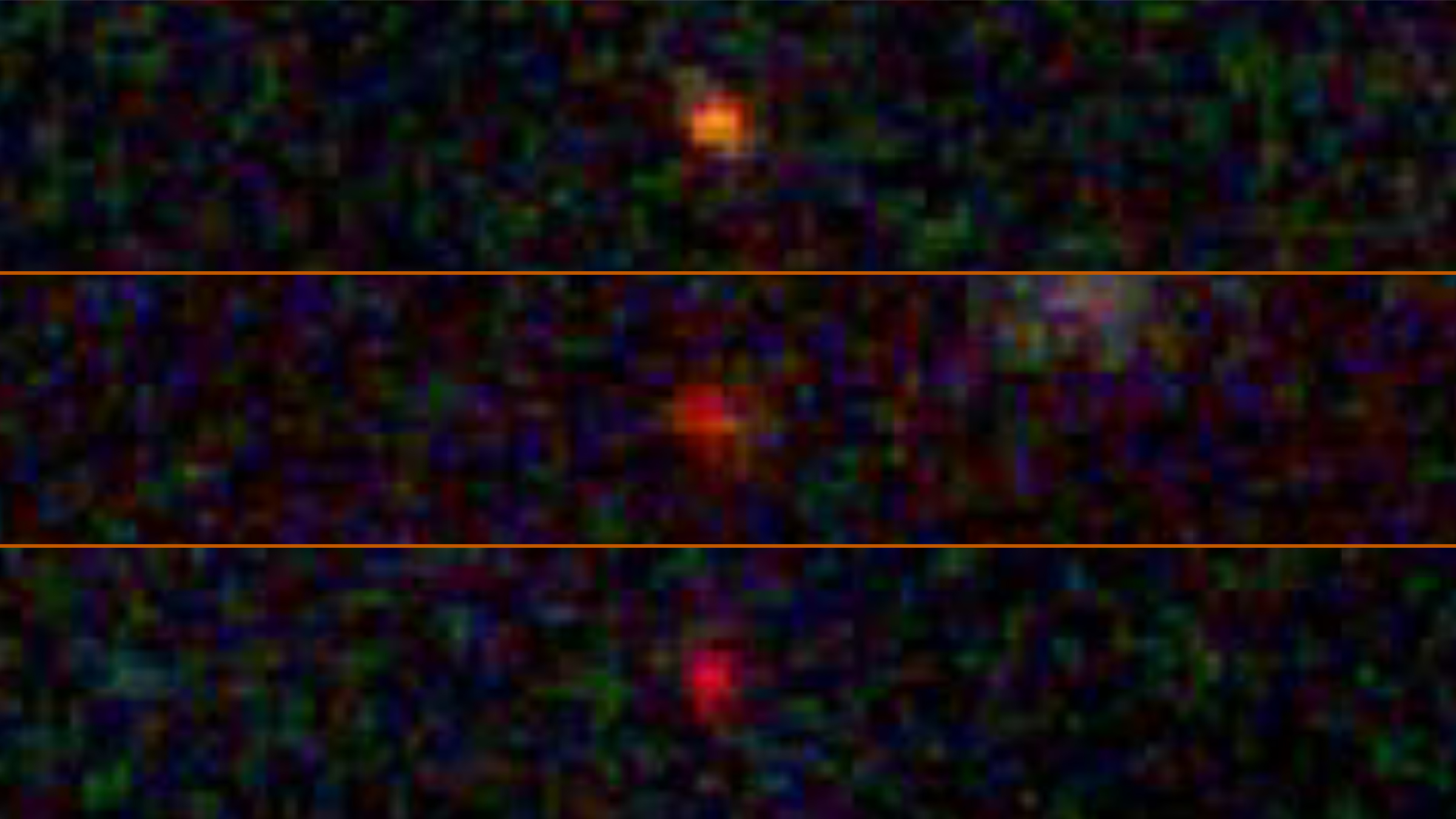 Three blurry red dots stand out in the blackness of space