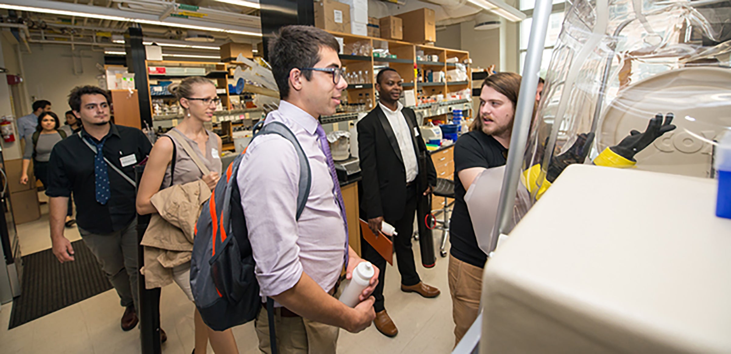 Prospective students tour a lab at the University of Texas at Austin