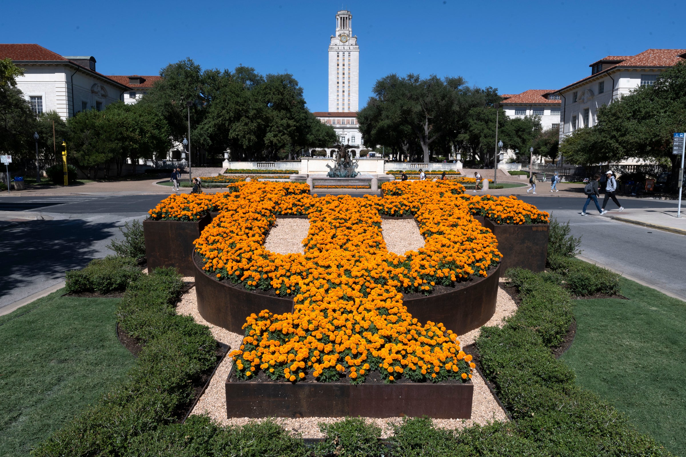 UT is spelled in flowers south of the main mall with the UT Tower in the distance