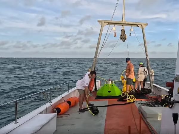 Scientists on a ship at sea