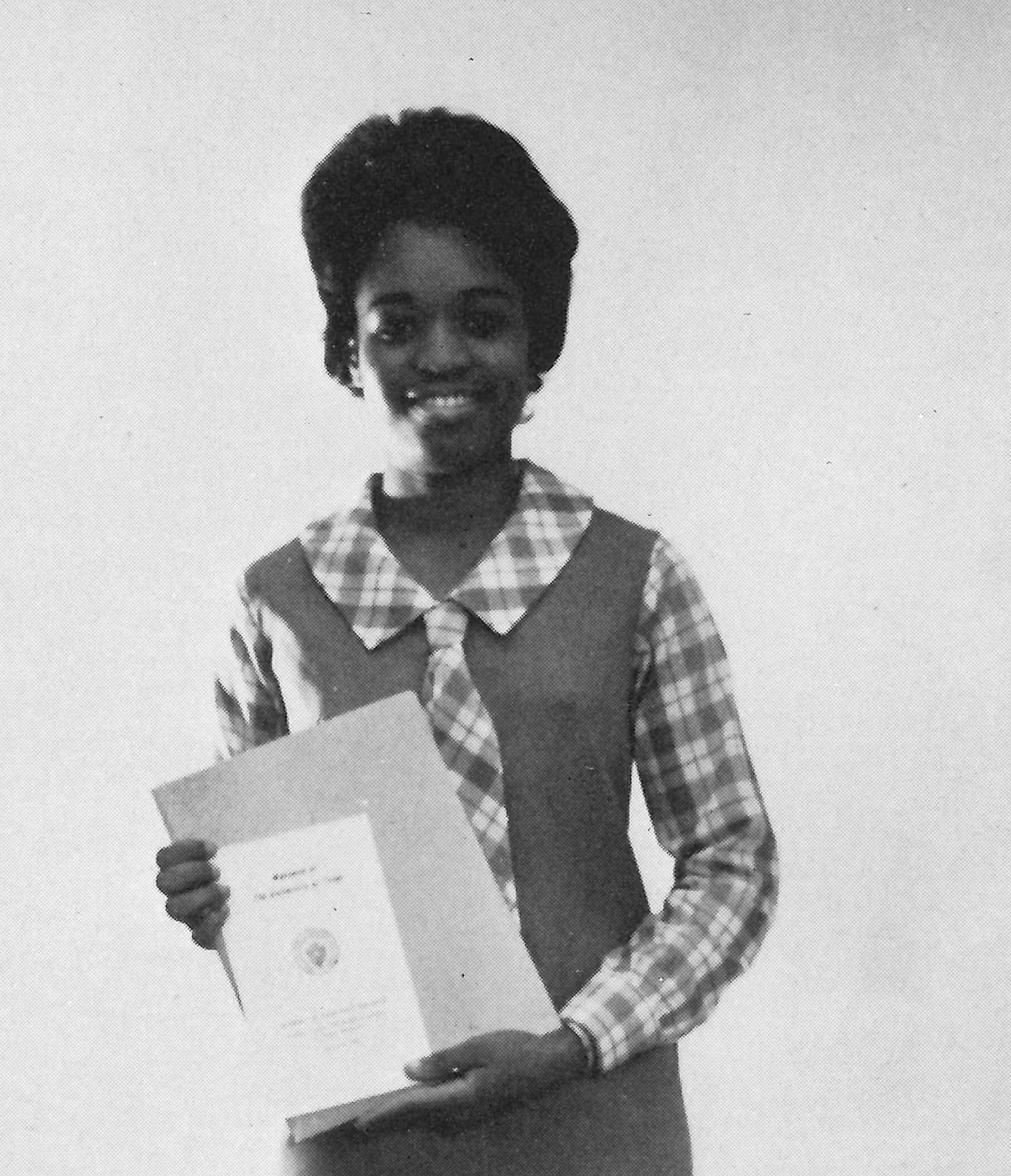 Anitha Mitchell in the Cactus Yearbook as an Oustanding Student of 1965