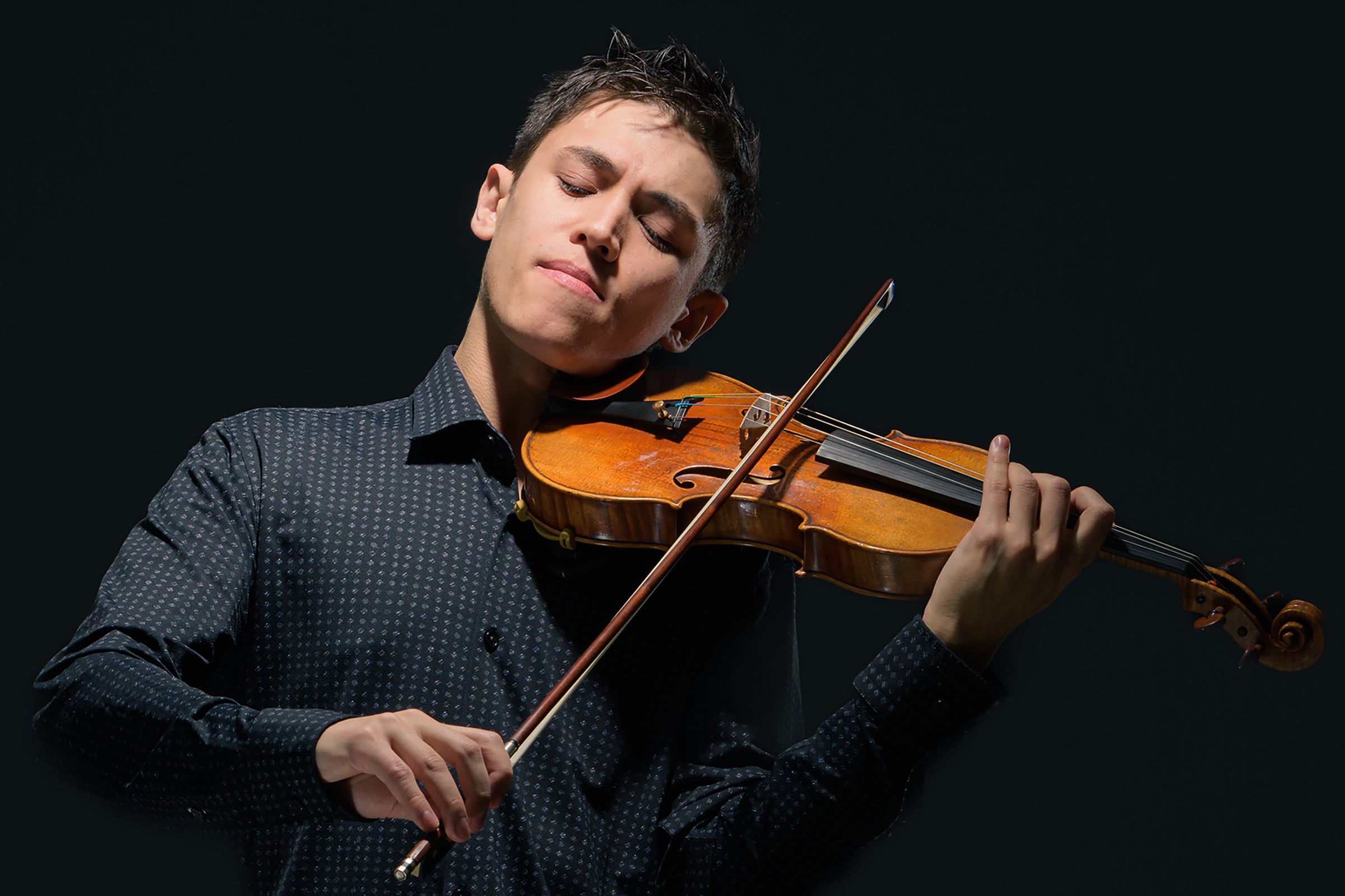 David Bernat playing the violin