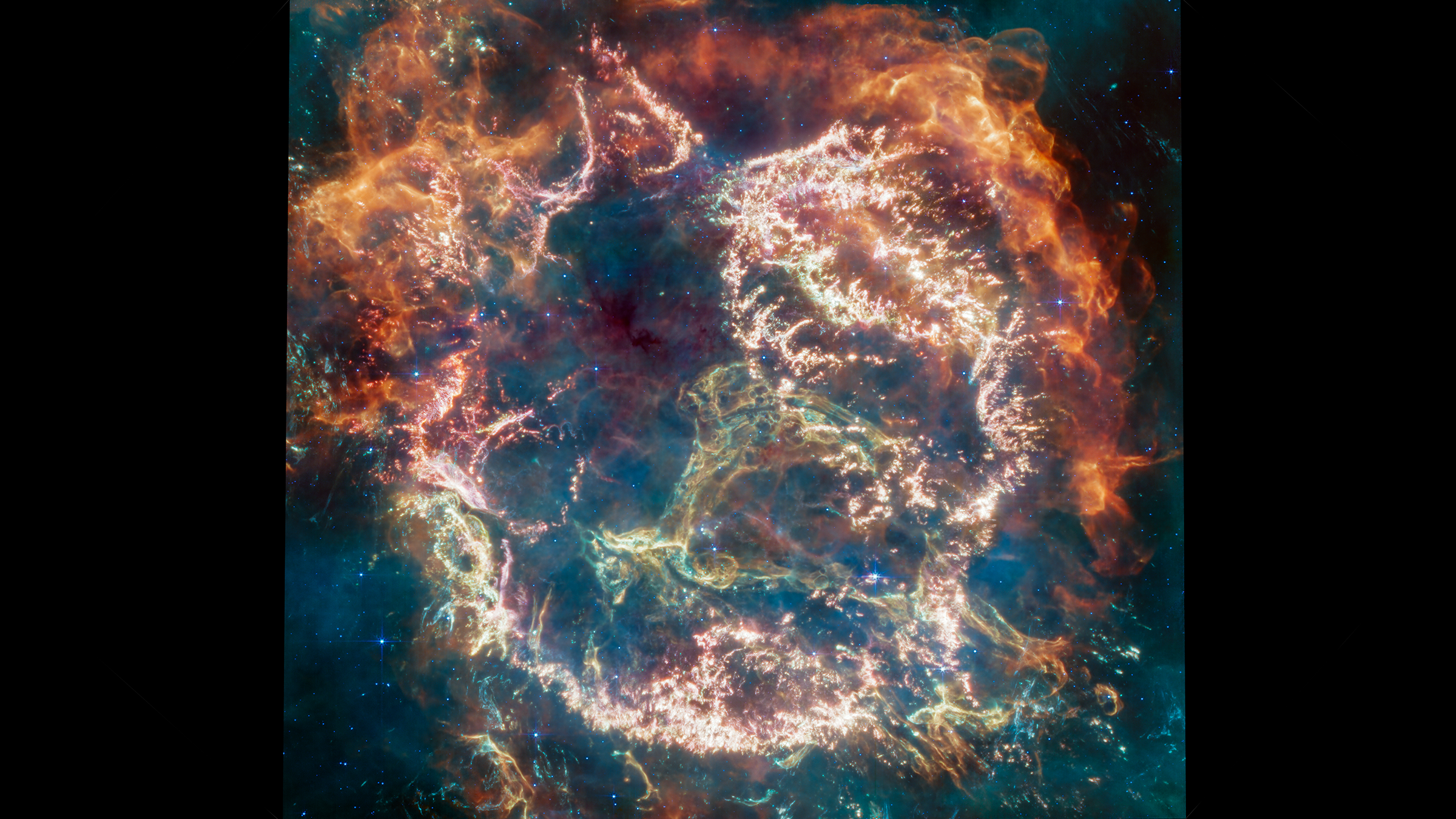 Colorful wisps of gas and dust are seen in this telescope image of the remains of a supernova explosion