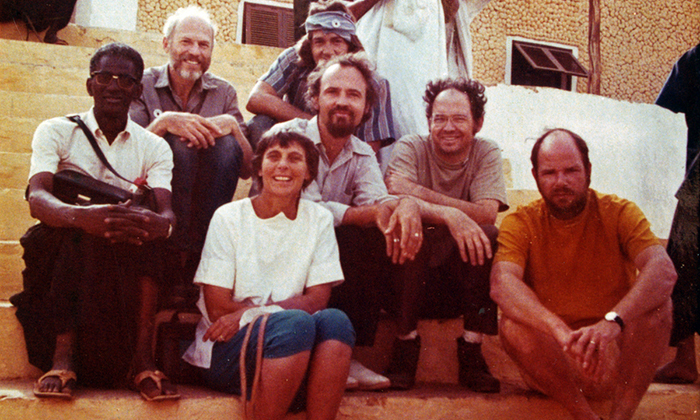 Cécile Dewitt-Morette with team of UT physicists (including husband Bryce Dewitt, back left) in Mauritania in 1973.