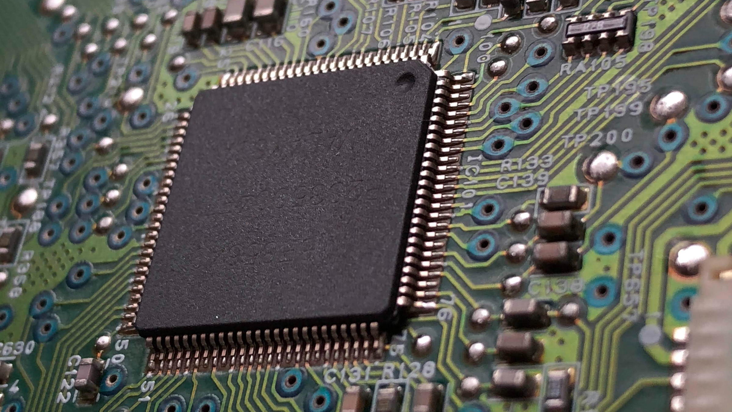 Computer chip sitting on a motherboard