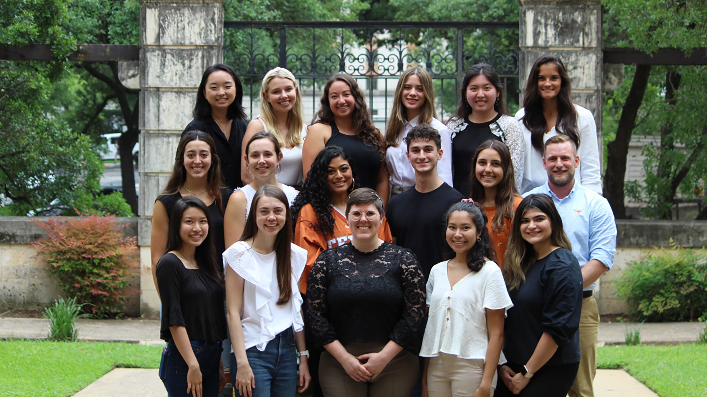 Group photo of a professor and several students