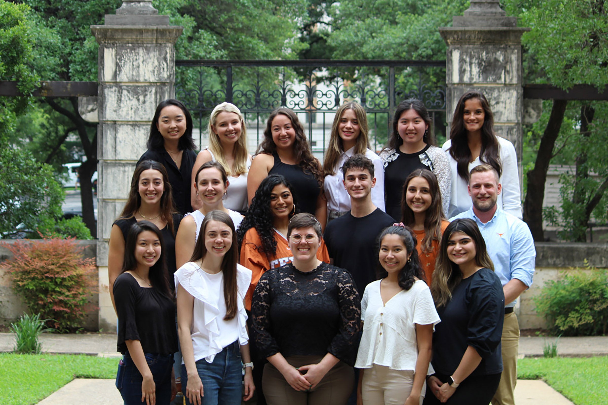 Group photo of a professor and several students