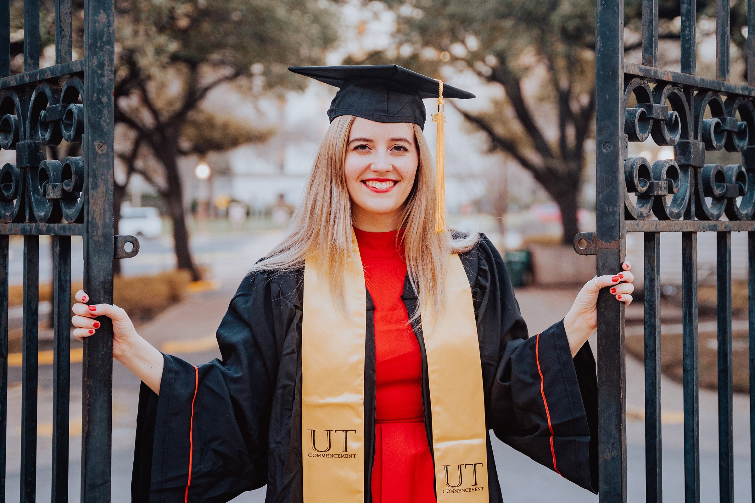 A young woman in a graduation gown