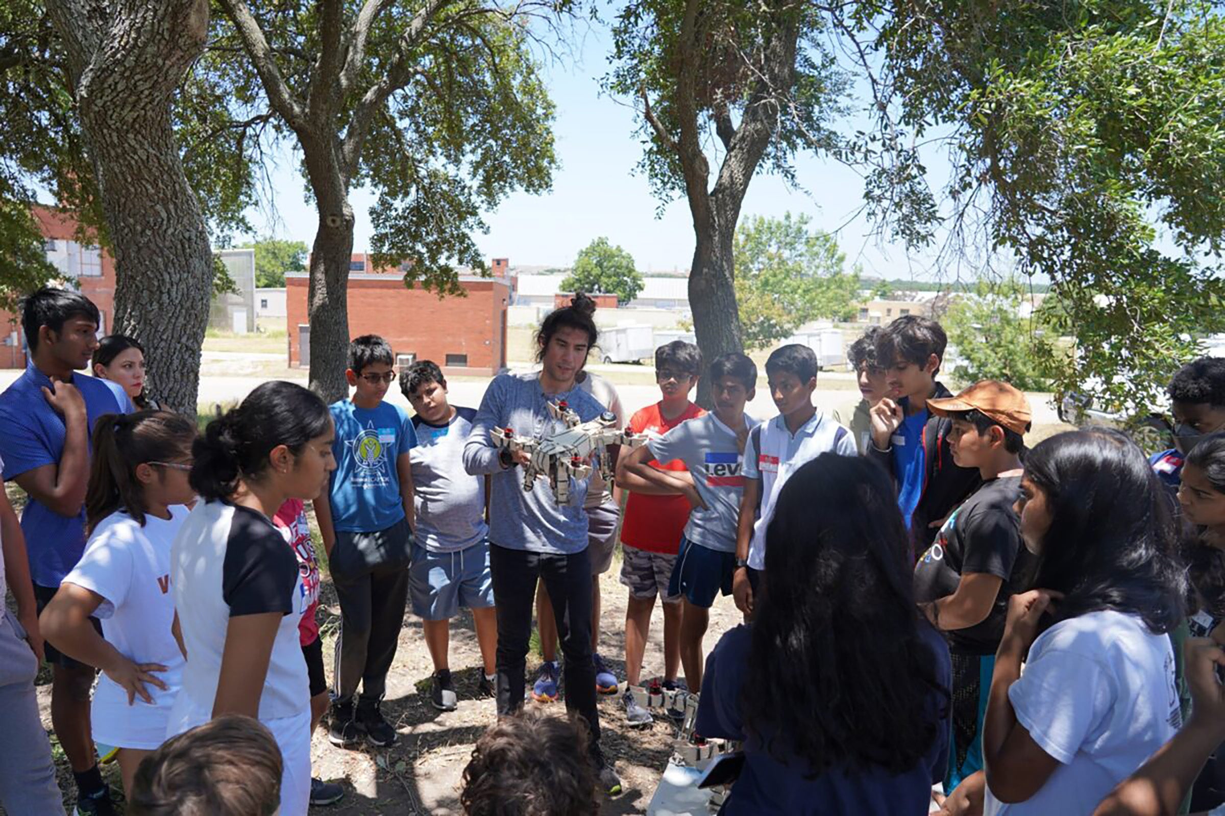 Young students watch a demonstration