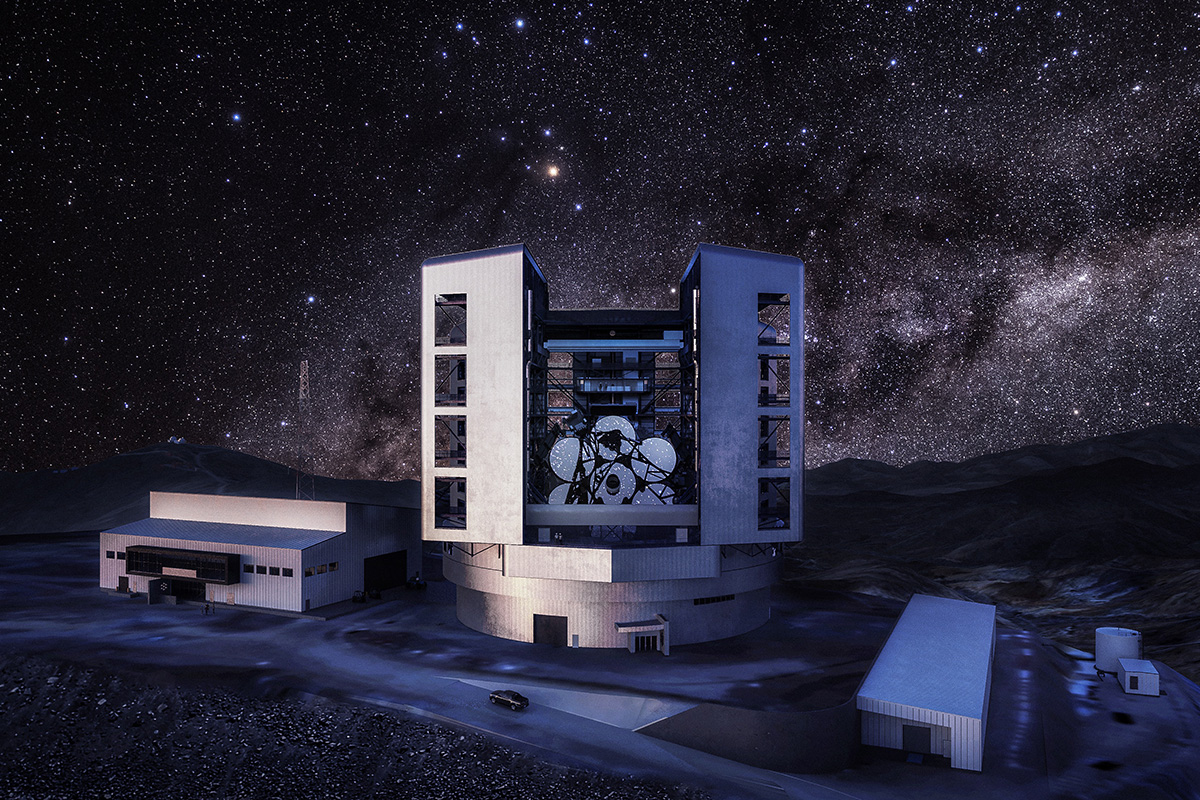 A giant telescope enclosure open to a starry night sky