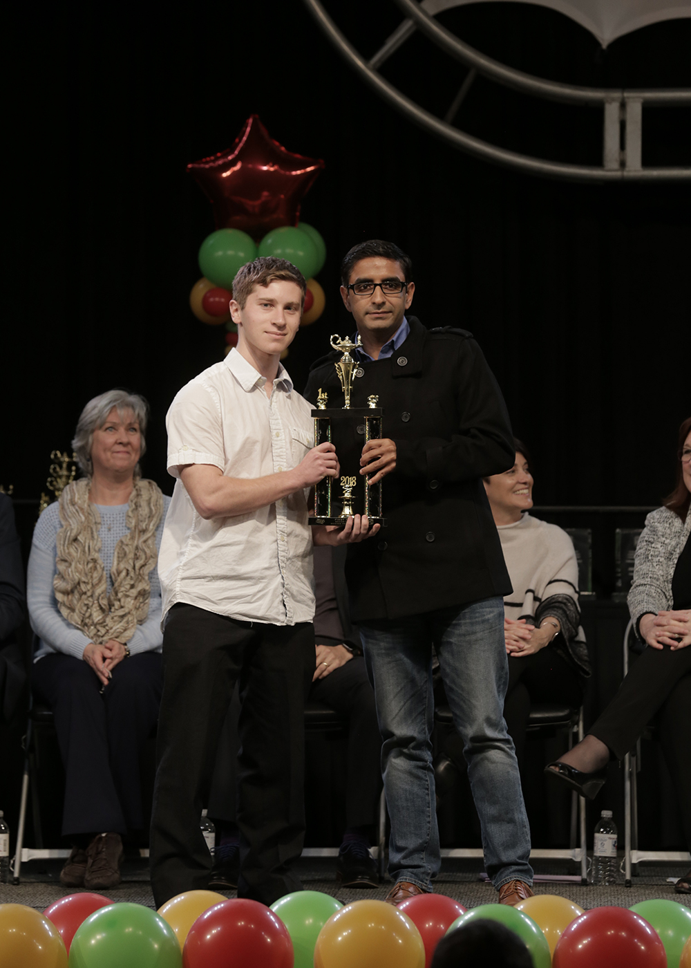 Bryce Yeazell receives his first place trophy at the Regional Science Fair. Photo by Austin Regional Science Festival.