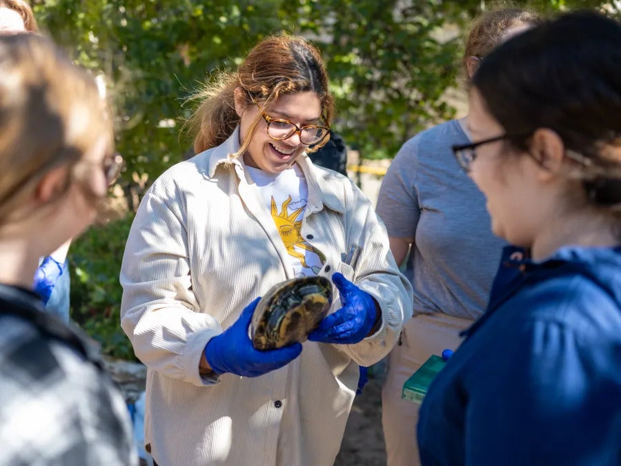 Mariangel holding a turtle.