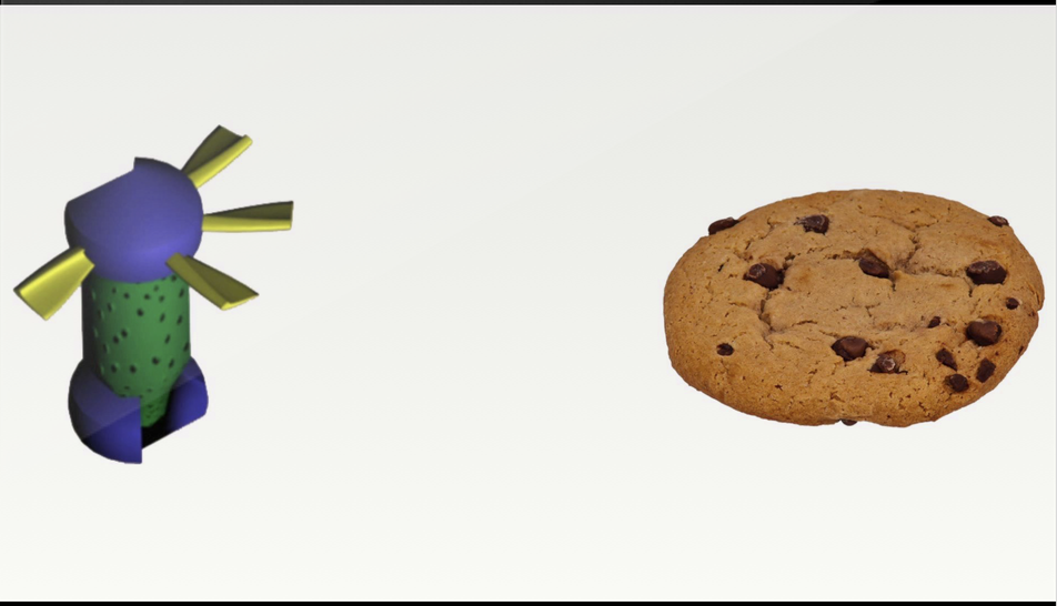 On the right is a cookie and on the left is a made-up toy that's tube-shaped with spokes radiating from the top