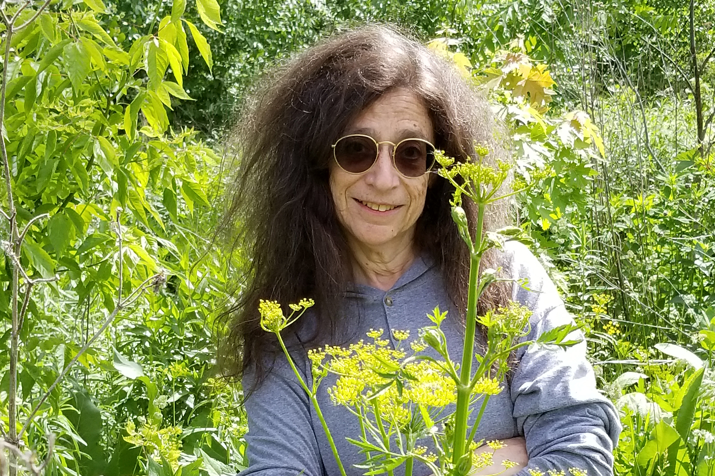 Dr. May Berenbaum in a field of parsnips