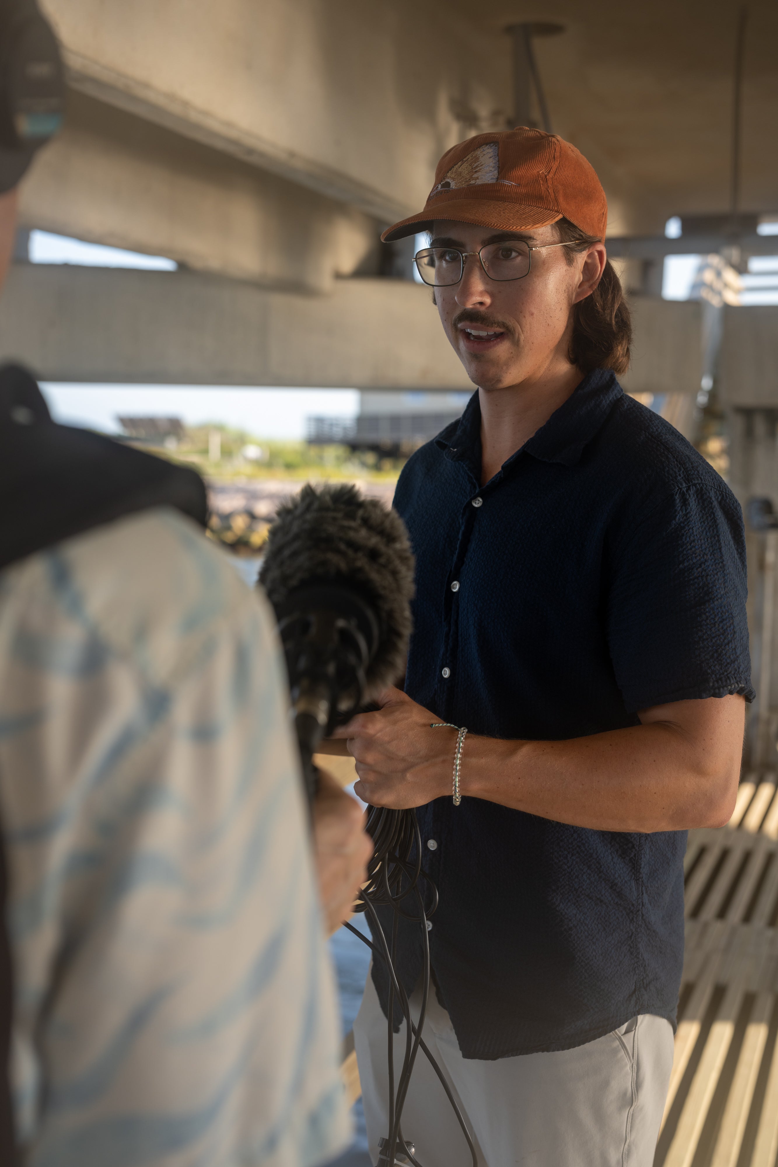 A scientist being interviewed for a podcast