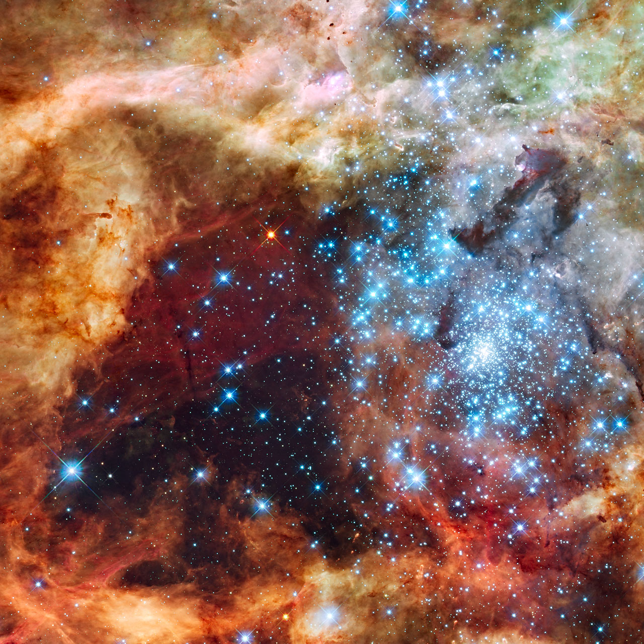Stars appear to form and shine brightly in a Hubble Telescope image