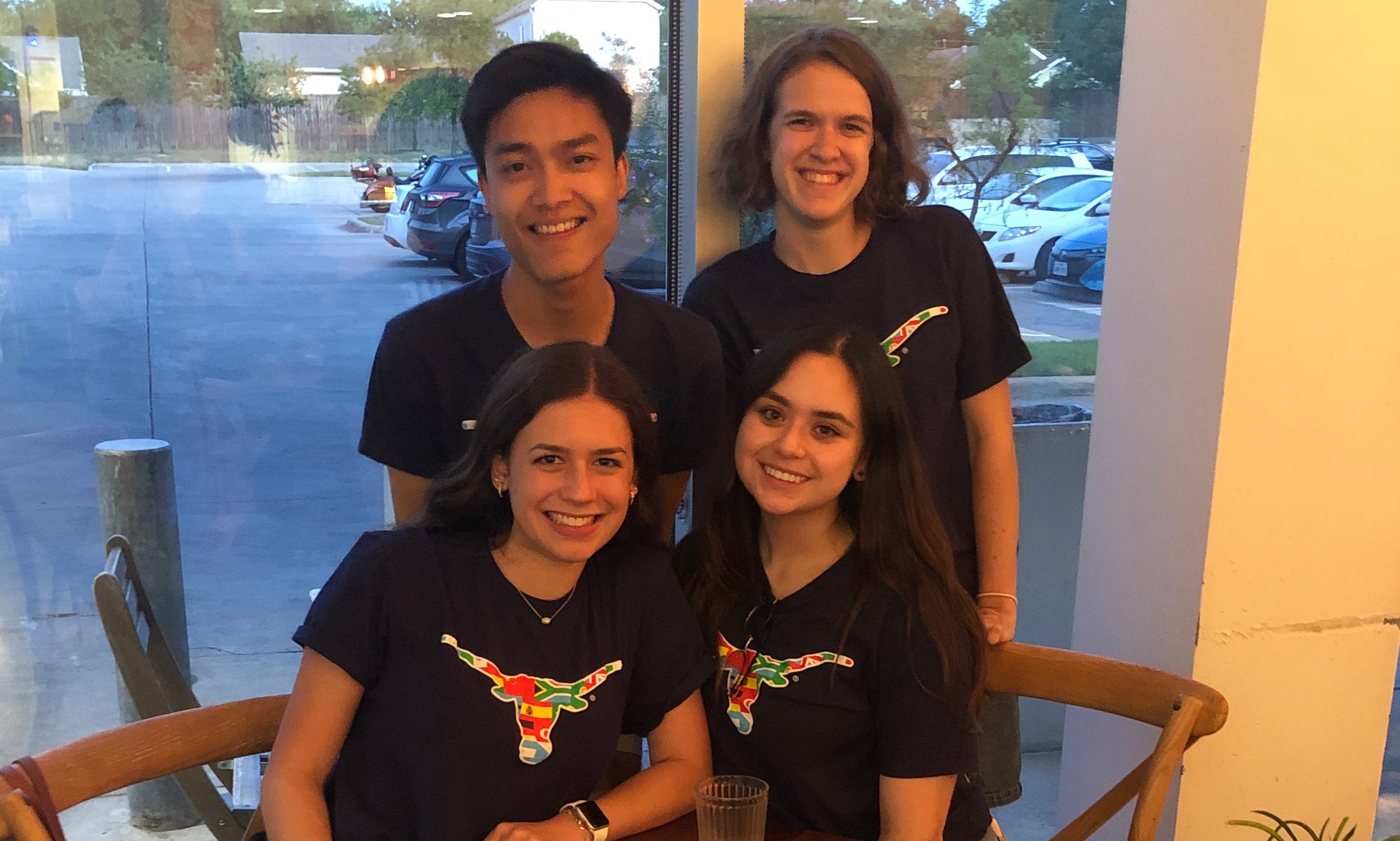 Four students in matching University of Texas tshirts