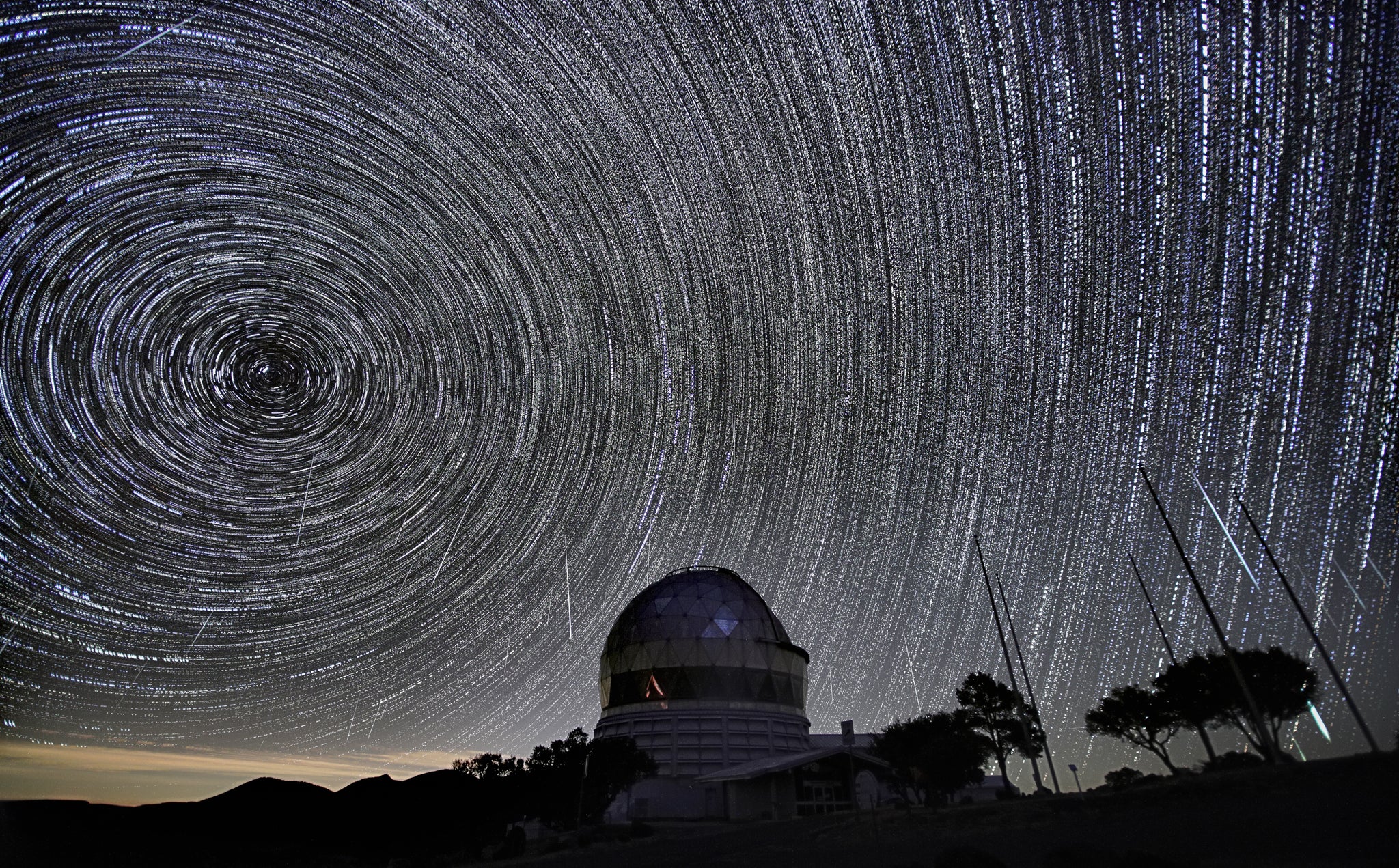 Star and Geminid meteor trails above the Hobby-Eberly Telescope