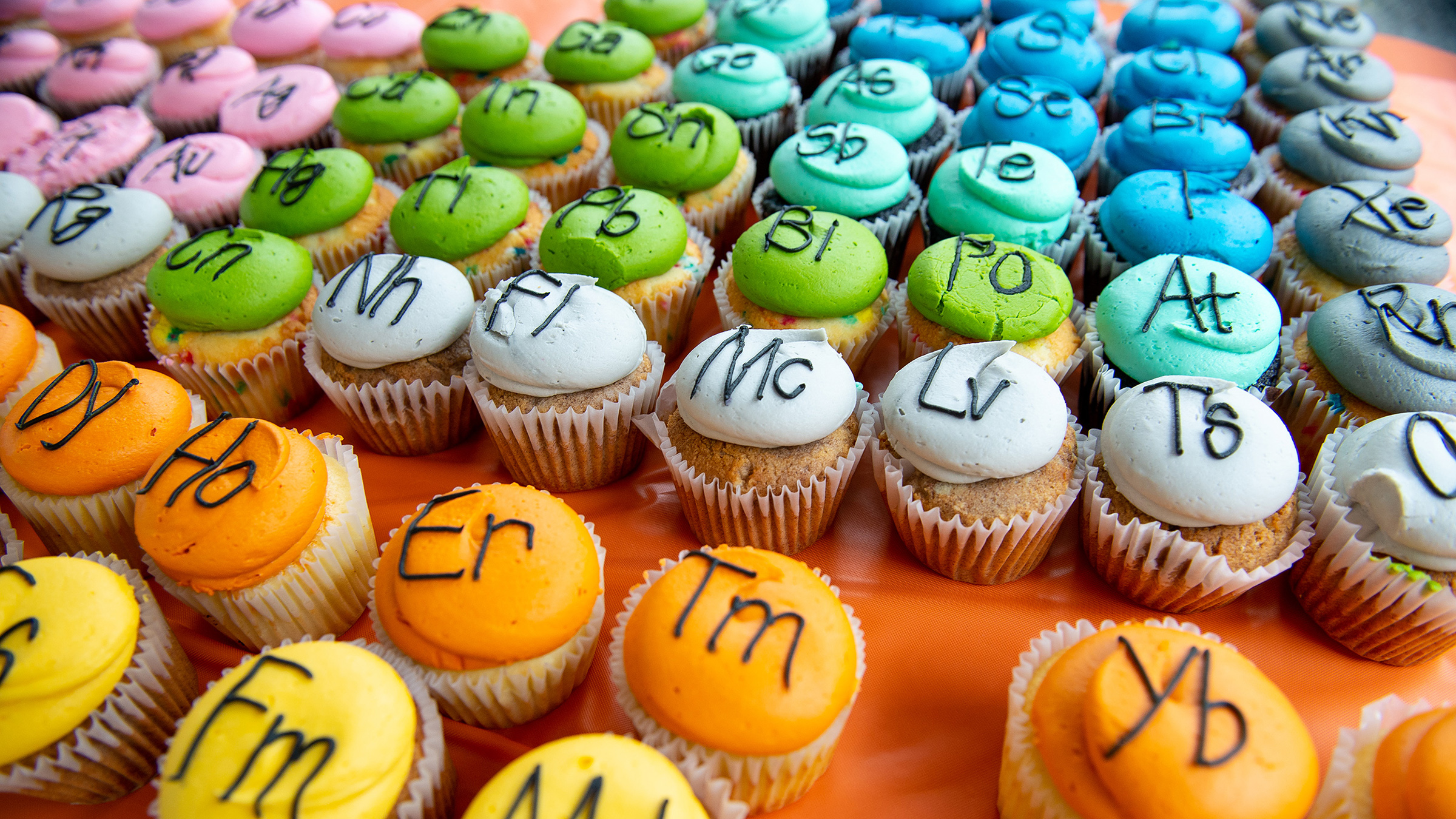 A series of cupcakes arranged to look like the periodic table