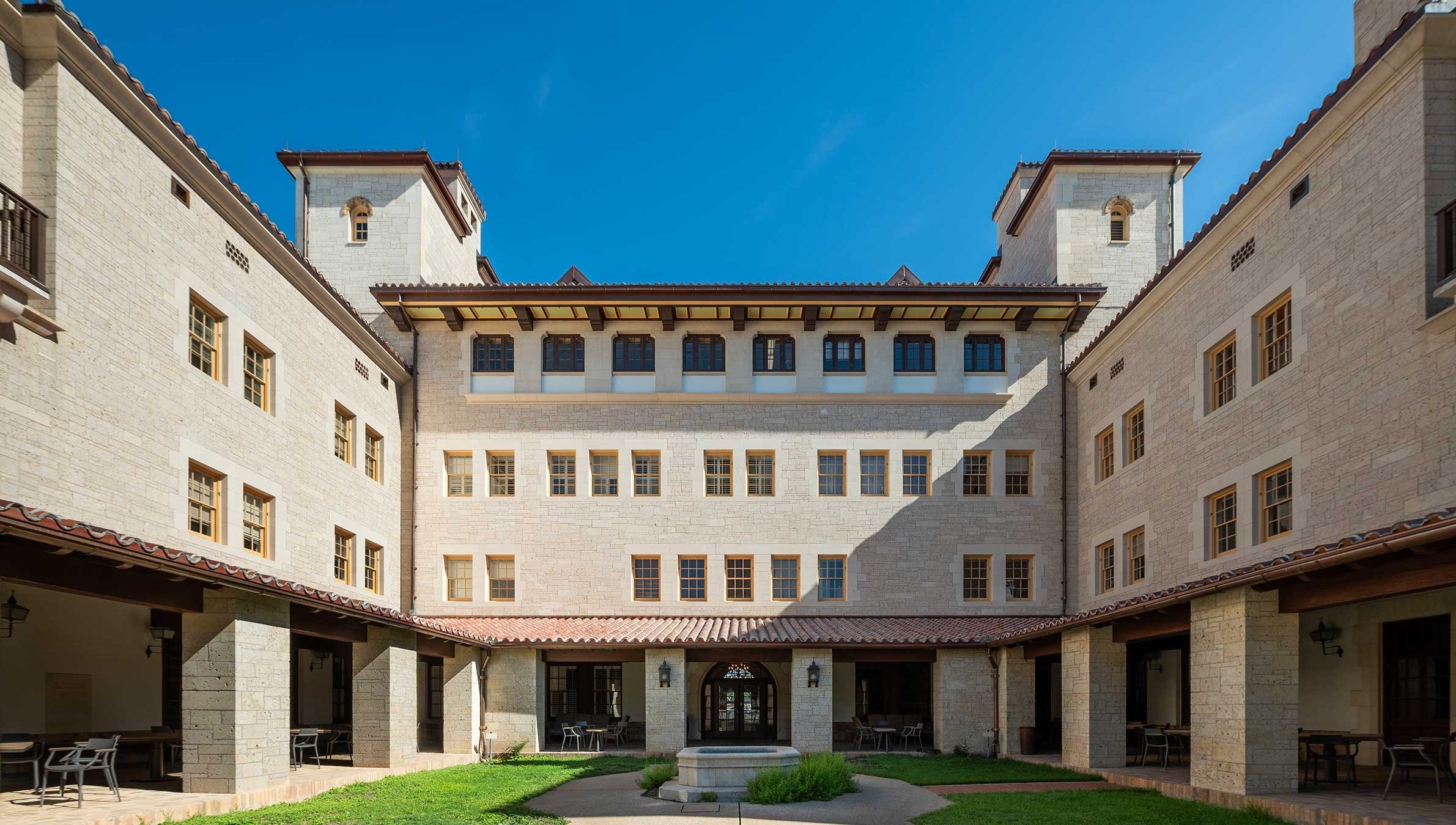 Gearing Hall, a Spanish style university building with a courtyard, on a sunny day