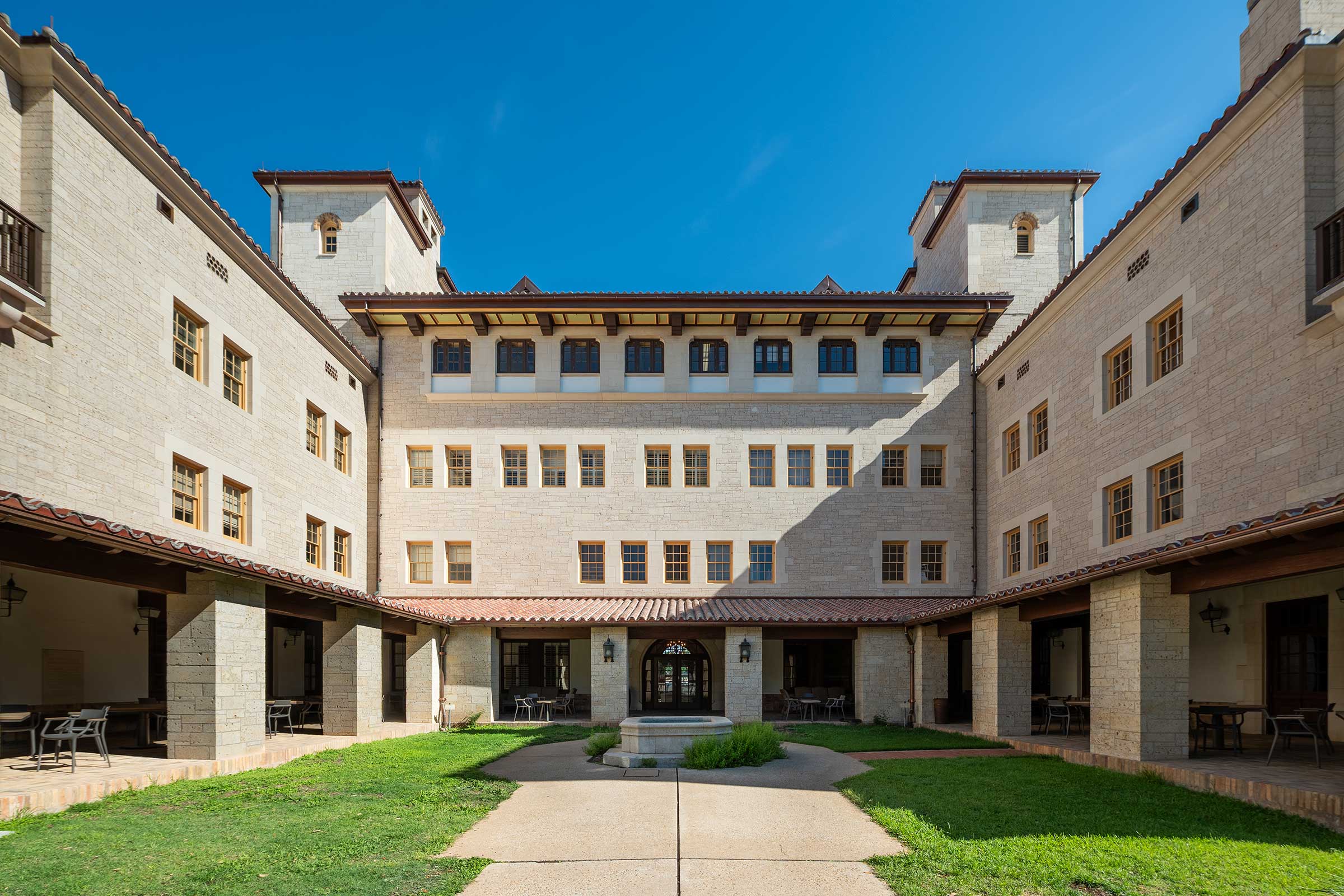 Gearing Hall, a Spanish style university building with a courtyard, on a sunny day